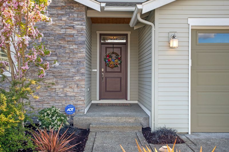 Modern home entrance with attached garage